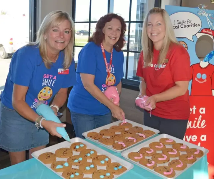 group of women at bake sale